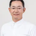 千里山田兄弟歯科 院長の写真