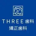 春日THREE歯科・矯正歯科のロゴ