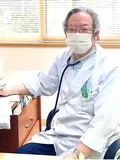 理事長 金 俊夫の写真