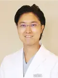 歯学博士 冨田 先生の写真