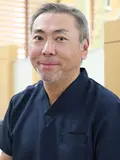 院長・歯学博士 丸岡 宗康の写真