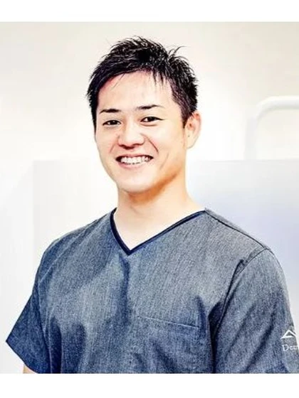 院長 歯学博士 築根 直哉の写真