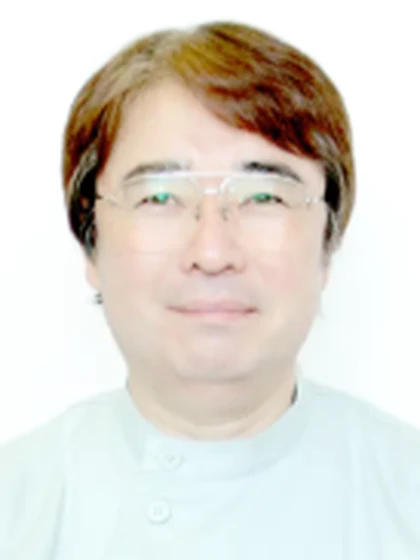 院長 歯学博士 友田 達の写真