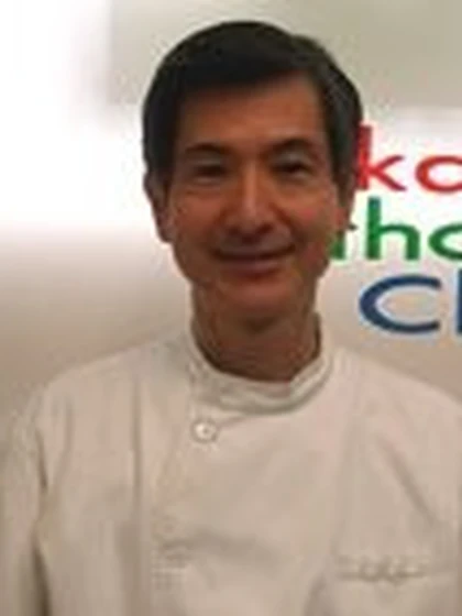 院長 歯学博士 岡本 安生の写真