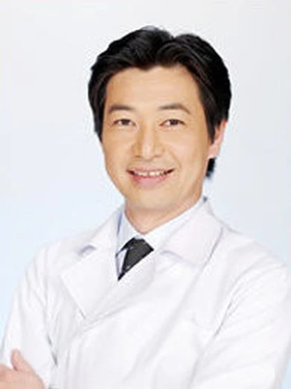 院長 歯学博士 富田 陽一の写真