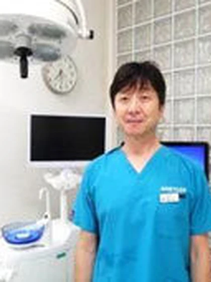 院長 歯学博士 堀本 真二の写真
