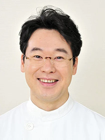 院長 歯学博士 手塚 貴雄の写真