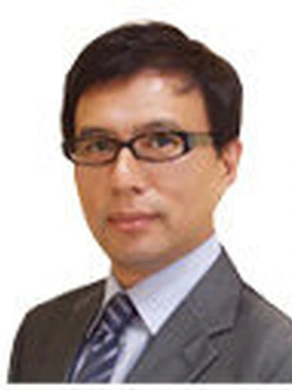 院長 歯学博士 河村 達也の写真