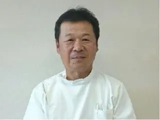 西本 関男の写真
